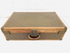 Louis Vuitton monogrammed canvas suitcase