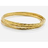 Five gold bangles