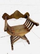 19th Century mahogany folding Savonarola chair heavily inlaid with brass