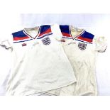 Two England football shirts, No 7 and No 9, both signed by Kevin Keegan