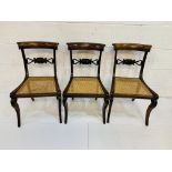 Three mahogany cane seat dining chairs