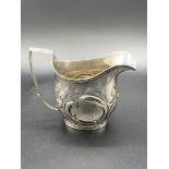 A Georgian silver cream jug hallmarked London 1807