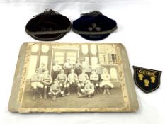 Black and white photograph of a Cheshire Rugby team circa 1895, a shirt badge and 2 velvet caps