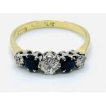 18ct gold and platinum claw set ring of 3 diamonds and 2 sapphires