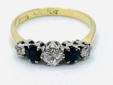 18ct gold and platinum claw set ring of 3 diamonds and 2 sapphires