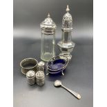 Silver sugar caster hallmarked London 1928 with other silver and plate items