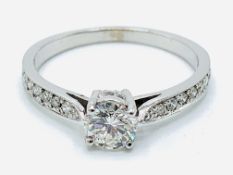 White gold round cut solitaire diamond ring