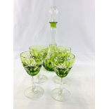 Green cut to clear faceted glass decanter with four wine glasses
