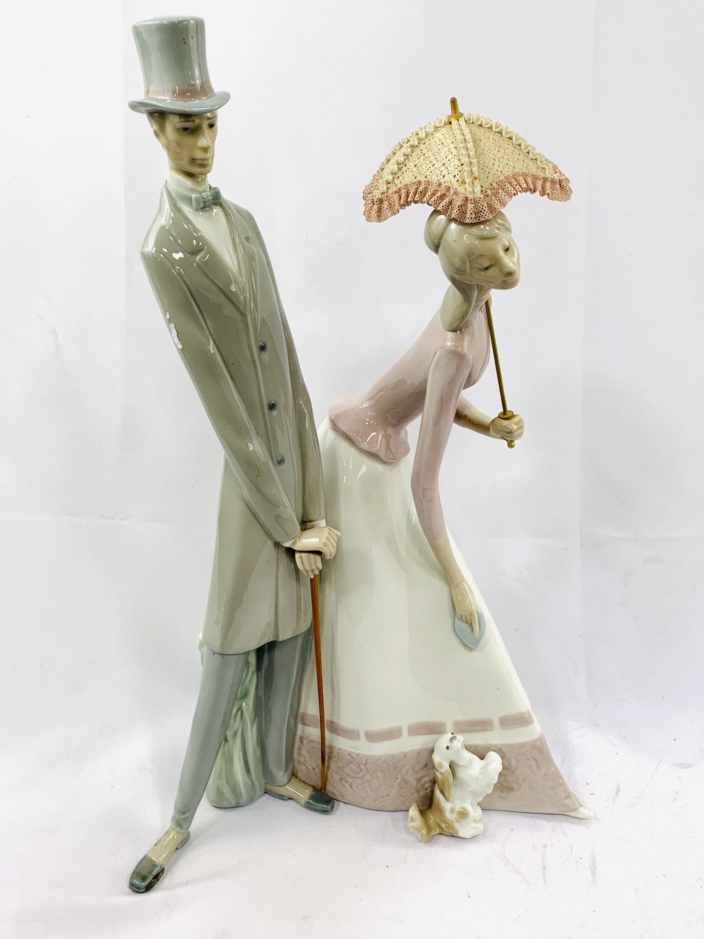 A large Lladro porcelain ornament "Group with parasol"