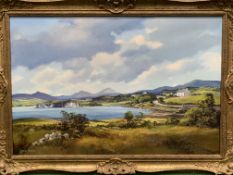 A gilt framed oil on canvas of an estuary scene with cottages, signed Denis Thornton