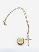 9ct gold circular locket together with a 9ct gold cross on a 9ct gold chain