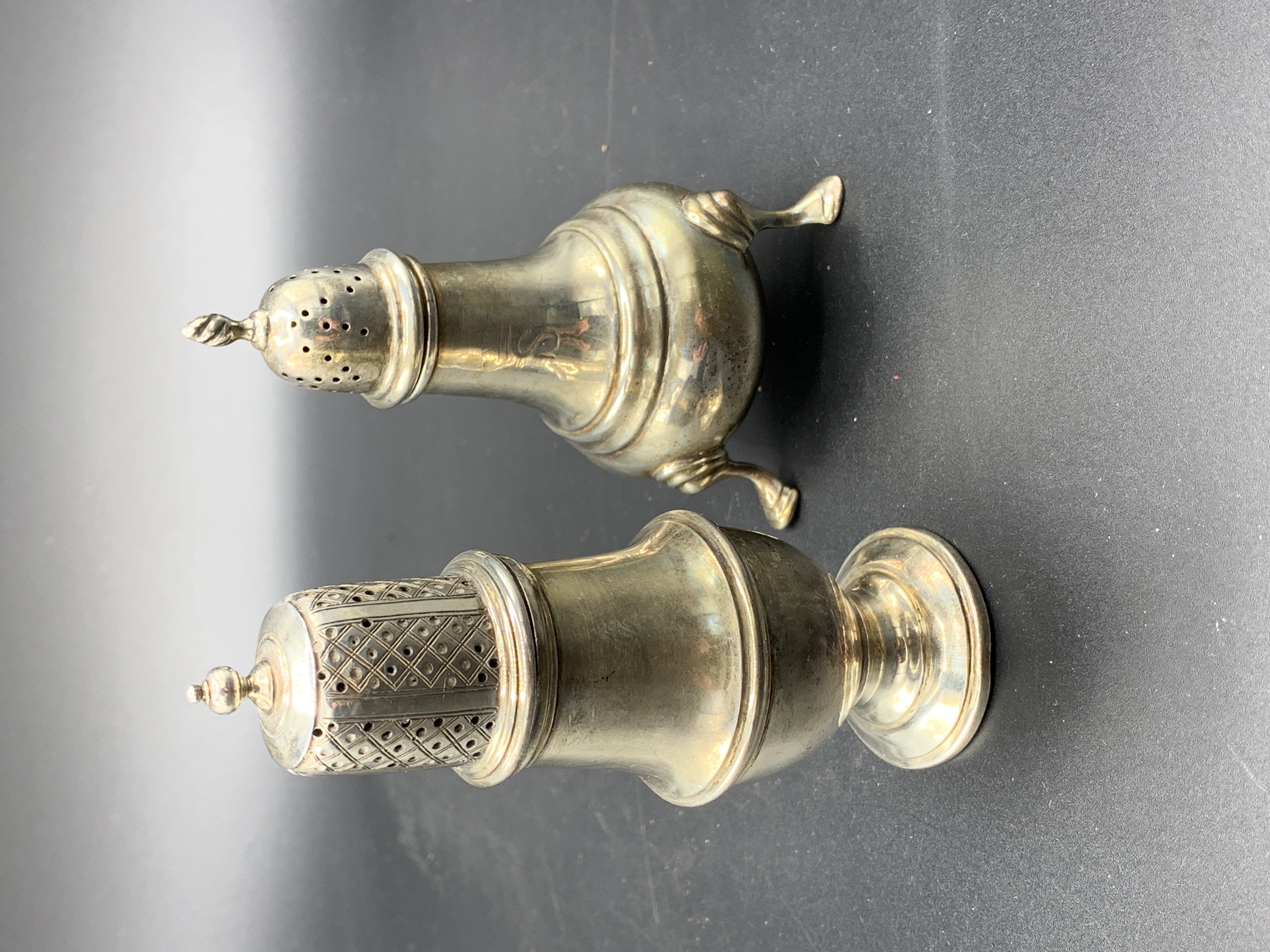 Two hallmarked silver pepper pots