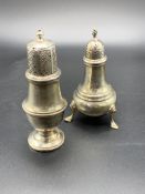 Two hallmarked silver pepper pots