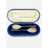 A pair of silver gilt berry spoons hallmarked London 1901 by Levesley Brothers, in original case