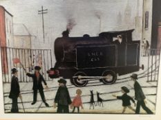 Framed and glazed print by L S Lowry signed in the margin