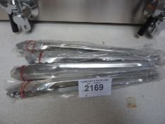 Four stainless steel tongs