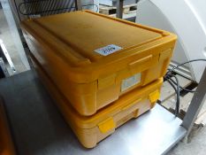 Two Rieber insulated food boxes.