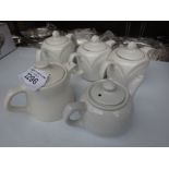 Five ceramic teapots