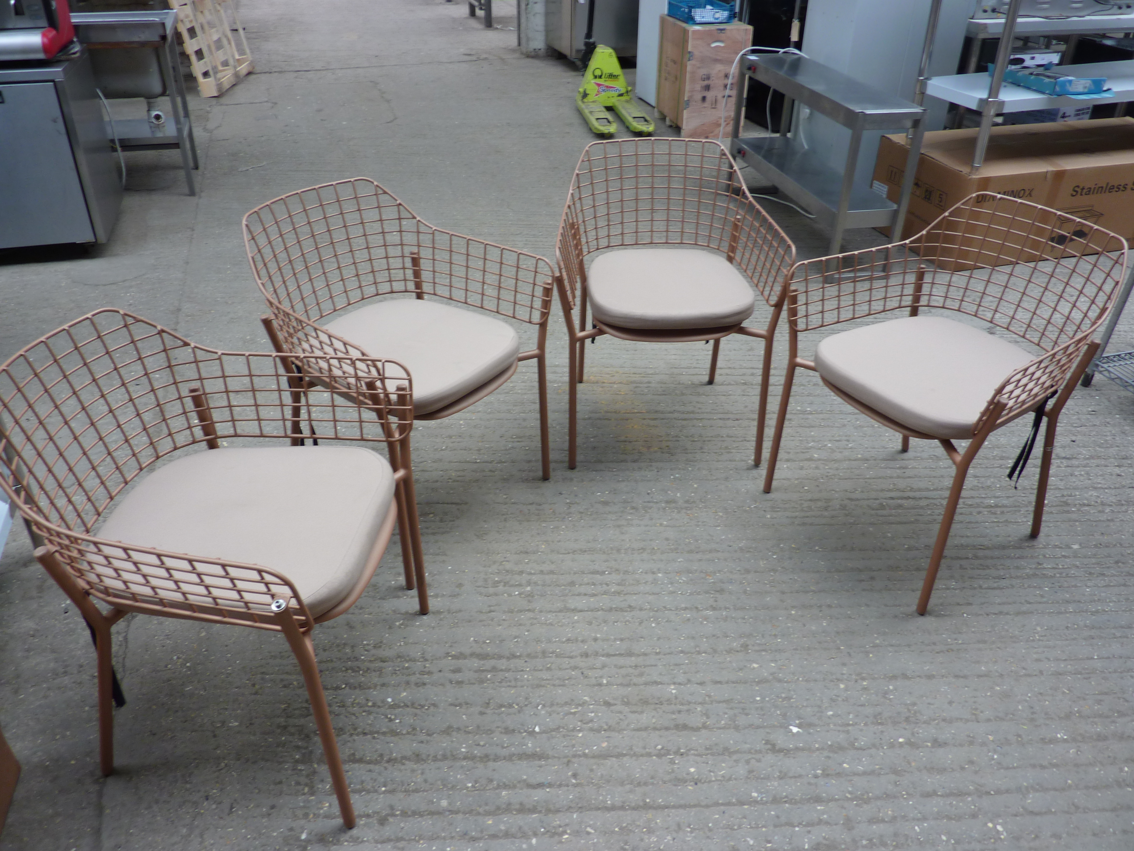 Four Emu metal stacking armchairs with four cushions - Image 2 of 2