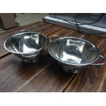 Two stainless steel colanders