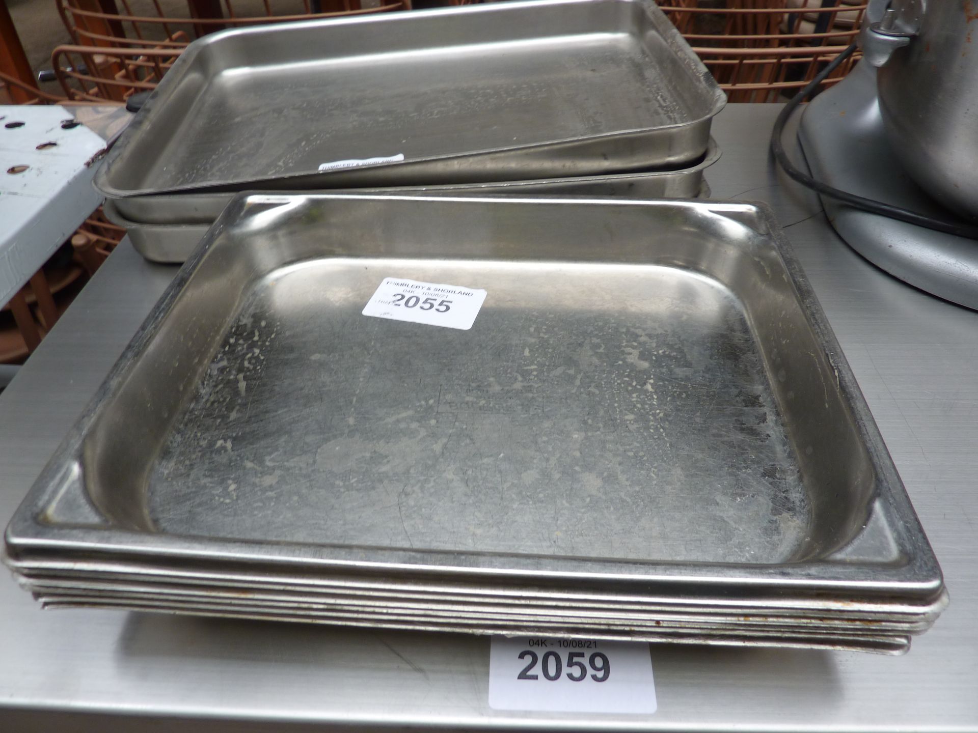 Six stainless steel baking trays