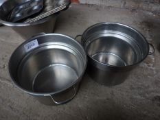 Two round containers with handles