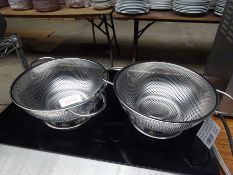 Two stainless steel colanders