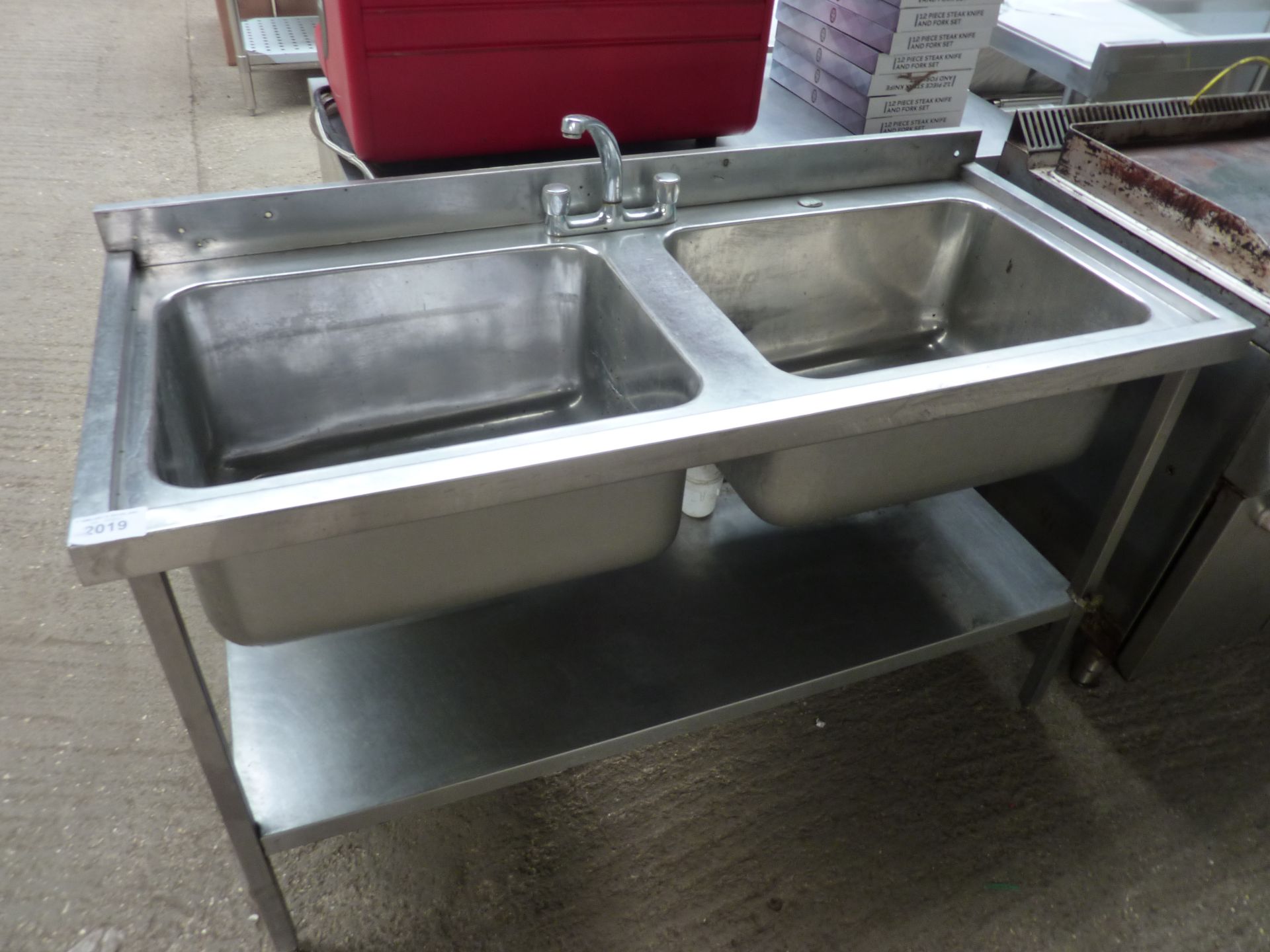 Double bowl sink with under shelf