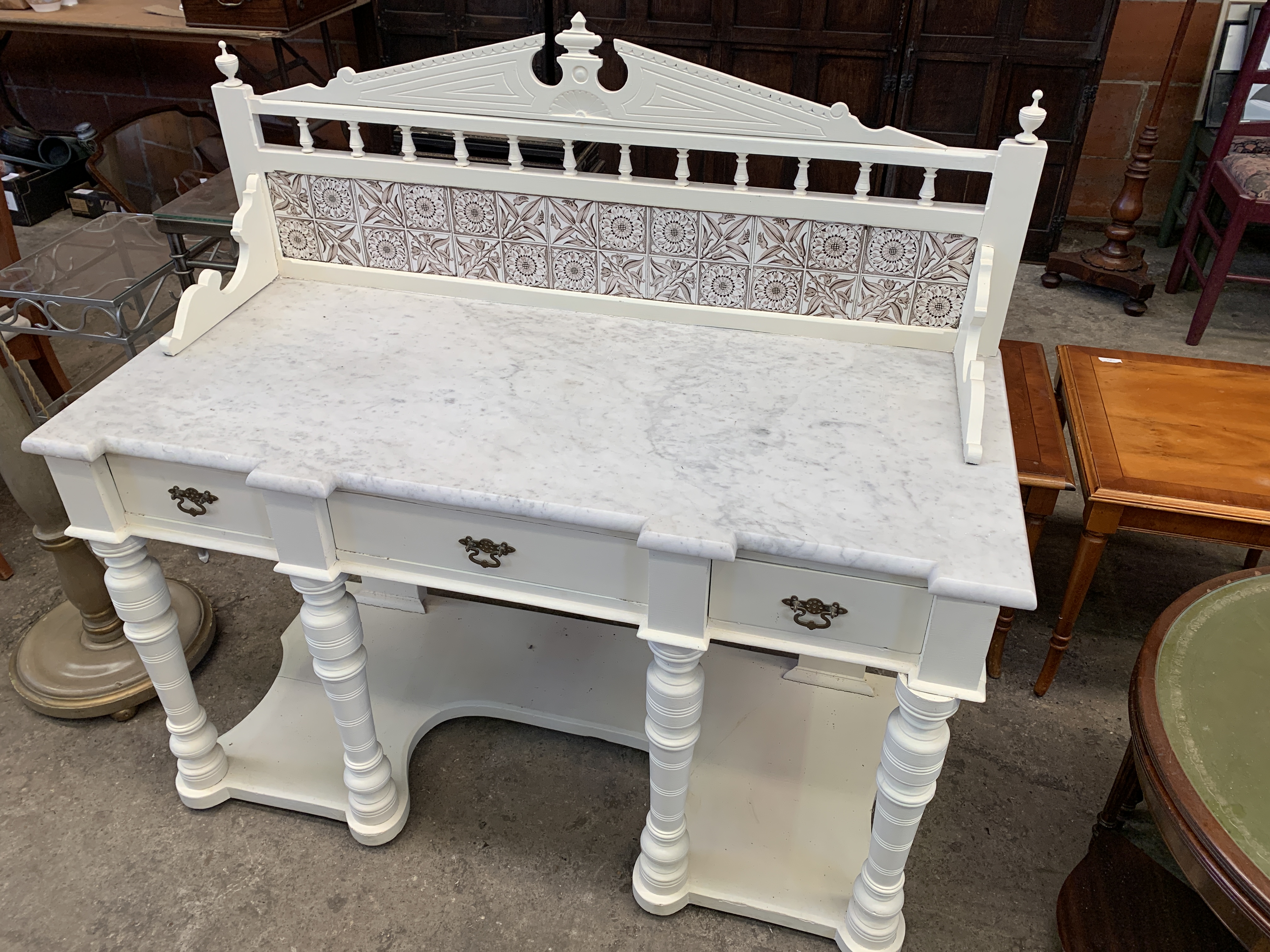 White marble and painted wash stand with tiled upstand