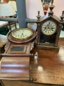 A carved oak mantel clock together with a mahogany drop dial wall clock