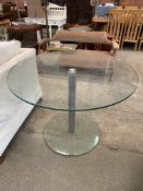 Circular glass top table