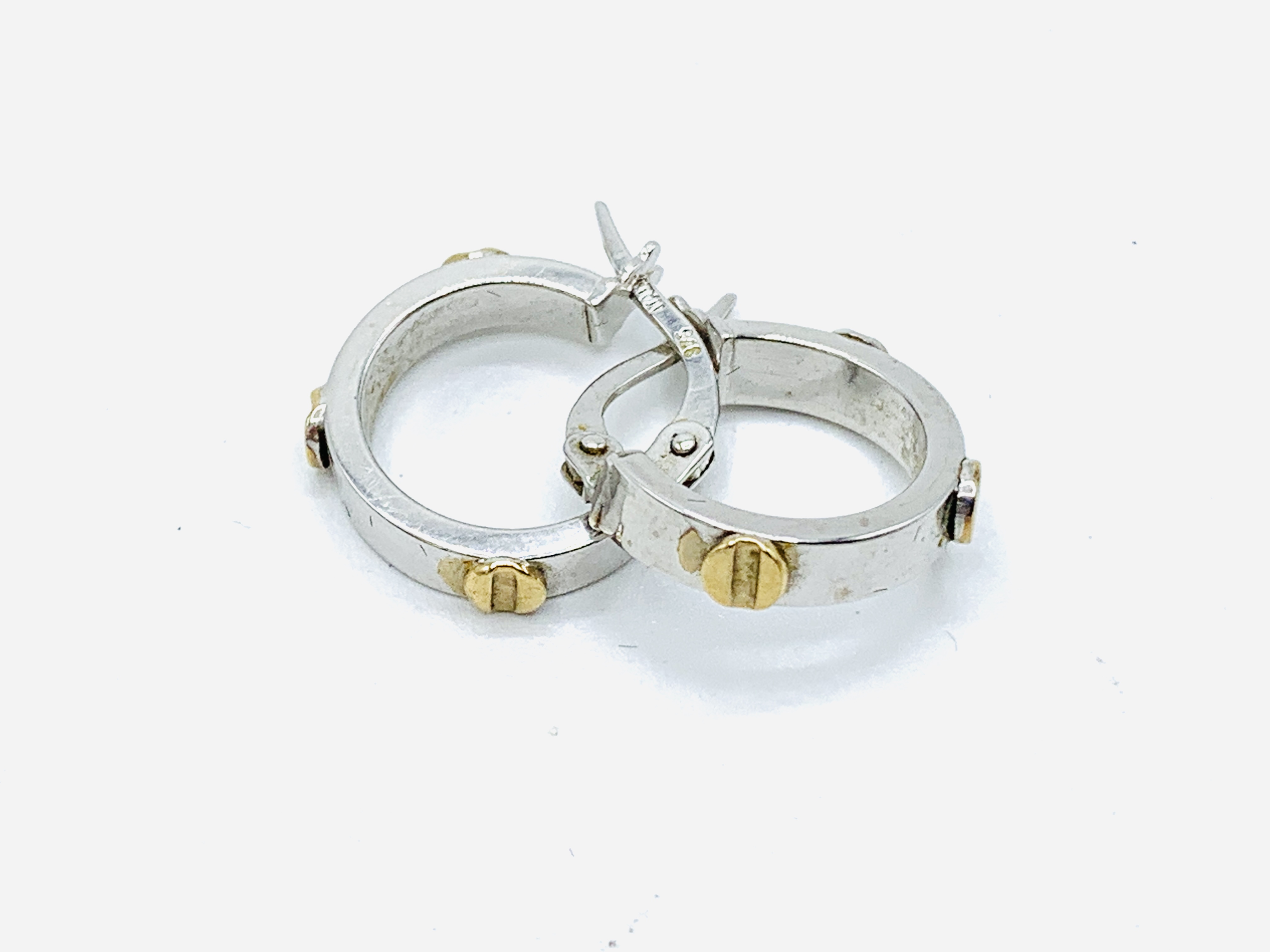A pair of 9ct white and yellow gold small hoop earrings - Image 2 of 2