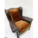 Dark brown faux leather deep wing back armchair