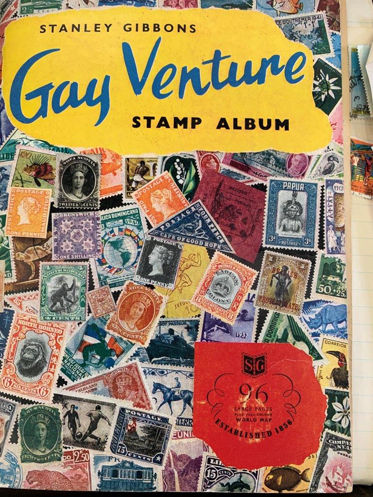 Junior stamp collection in Gay Venturer album and loose material
