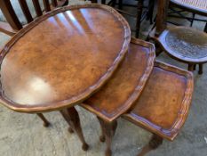 Walnut and mahogany nest of three tables