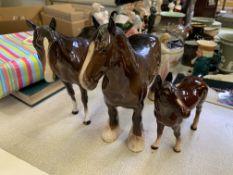 Beswick shire horse together with two others.