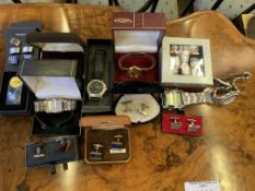 A quantity of cufflinks and watches