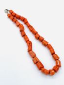 A coral bead necklace