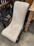 Victorian nursing chair upholstered in cream jacquard fabric