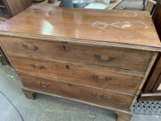 A mahogany chest of three graduated drawers.