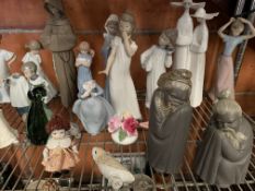 A quantity of Lladro and Nao figurines, including Chinese Monks