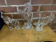 Three Waterford crystal figures