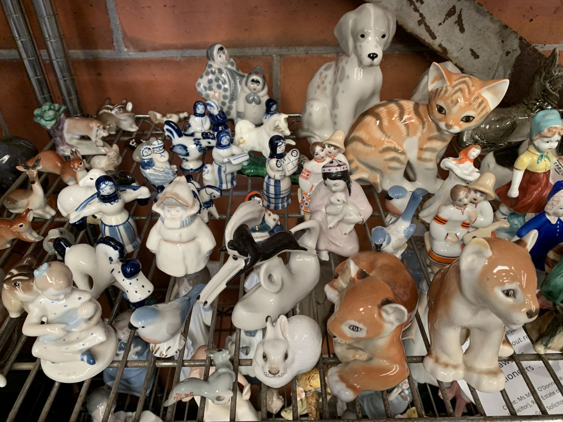 Approximately 100 Russian made ceramic figurines