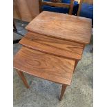 Nest of three teak tables