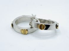 A pair of 9ct white and yellow gold small hoop earrings