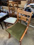 Two mahogany chairs together with a mahogany piano stool