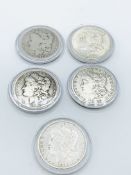Five US Morgan silver dollars