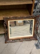 Carved wood frame wall mirror