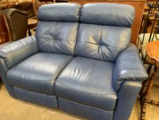 Blue reclining two seat sofa