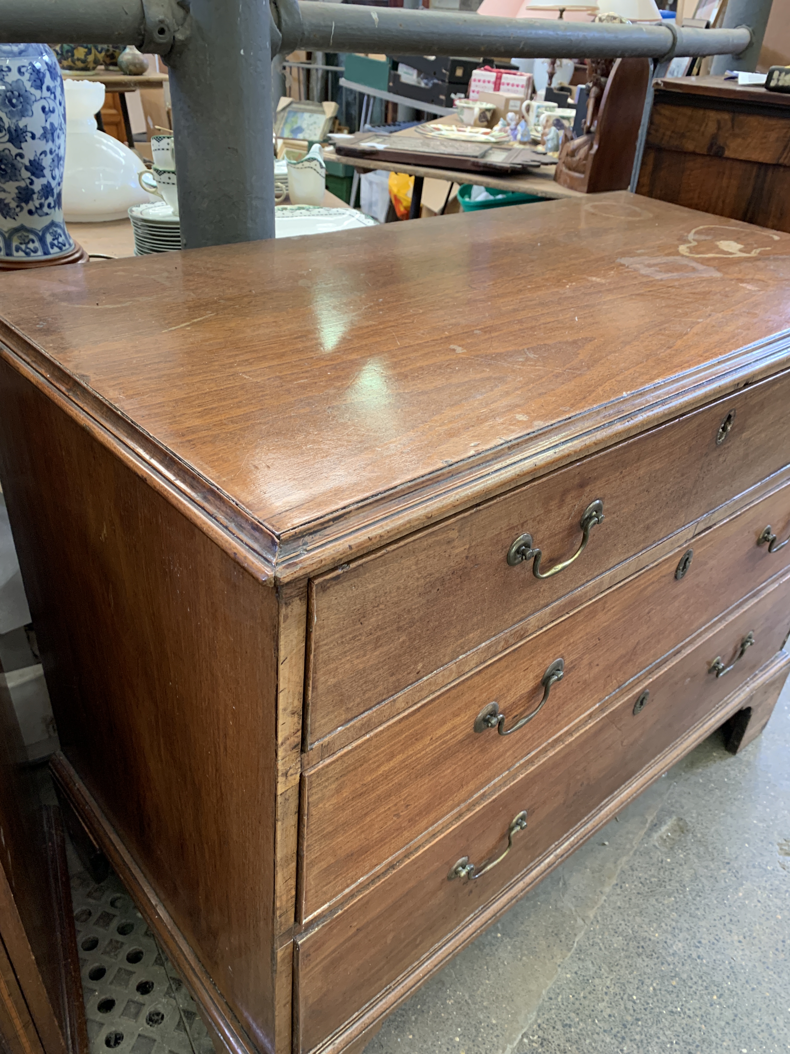 A mahogany chest of three graduated drawers. - Image 6 of 7